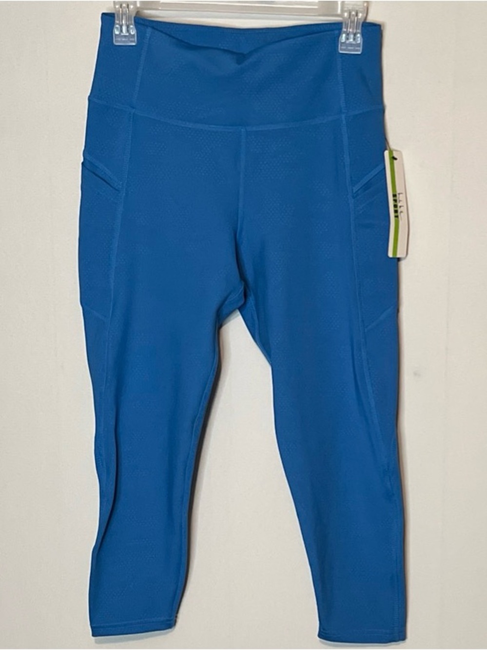 New W/T Nicole Miller Sport Leggings Size Large Pockets Blue.
